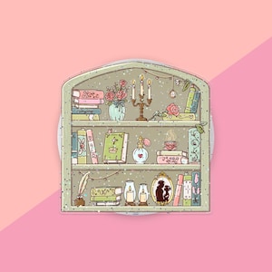 May include: A sticker featuring a three-shelf bookcase illustration in a light green frame. The shelves contain various books, a vase of pink flowers, a candelabra with three lit candles, a perfume bottle, a teacup, a quill, and a framed silhouette.