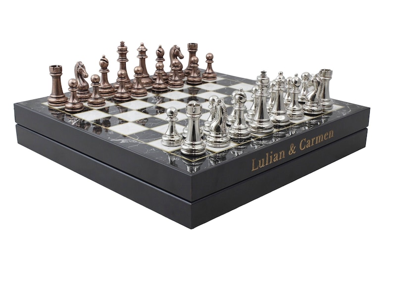 This personalized name chess set with wooden chess board and cast-iron figures is designed aesthetically to satisfy every chess player