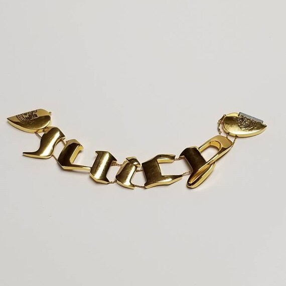 Juicy Couture Gold Slide Charm JUICY Bracelet