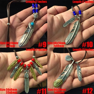 May include: Four silver feather necklaces with brown leather cords. The necklaces feature different feather designs and sizes. The necklaces are 17 inches long. #9, #10, #11, #12