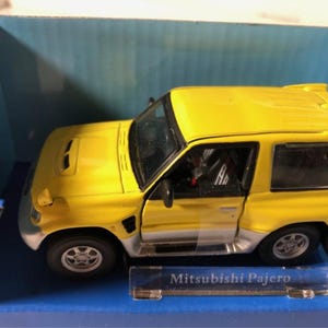 Cararama Mitsubishi Pajero Diecast Model Car - Scale 1/43 - Yellow - Diecast Metal Collectors Model - Original Box - Vintage