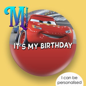 May include: Red racing car with a smiling face, the words "It's My Birthday" are printed on the red background.