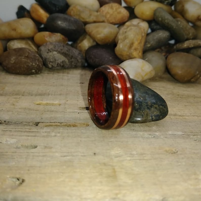 Brazilian cherry and padook with copper inlay ring Available all sizes US.