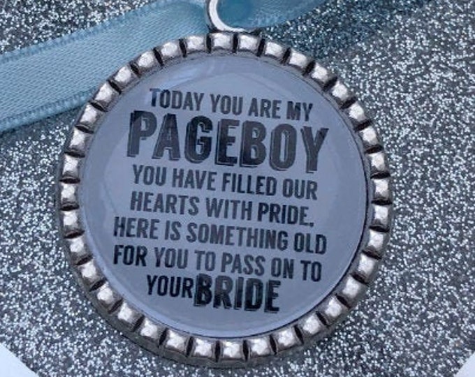 Page boy keepsake something old for his bride to be something blue beautiful keep sake blue ribbon charm pendant. thank you.