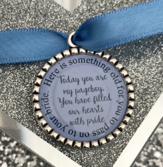 Page boy keepsake something old for his bride to be something blue beautiful keep sake blue ribbon charm pendant