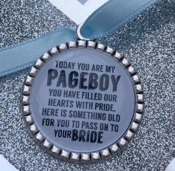 Page boy keepsake something old for his bride to be something blue beautiful keep sake blue ribbon charm pendant. thank you.