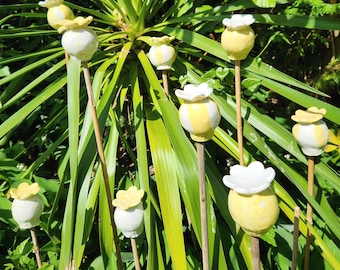 Whimsical cane toppers or garden decorations