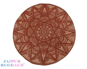 May include: A round jute rug with a red mandala design. The rug has a natural jute texture and a red printed design.