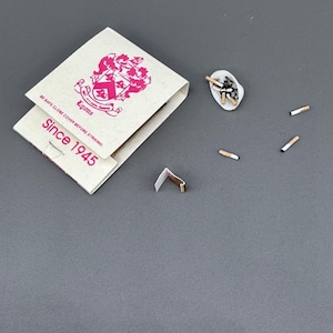 1:12 scale miniature cigarettes and shell ashtray with matchbook