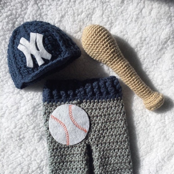 Baby, New York Yankees hat and pant set with baseball appliqué. Baseball bat optional.