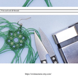 May include: Green macrame earring with a light green gemstone in the center. The earring is on a light blue surface with a pair of scissors and a lighter.