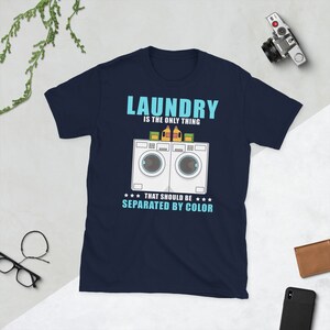 Laundry is the only thing, separated by color, gender neutral t