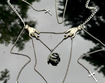 Hands in Dragger Metal chain necklace