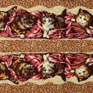 May include: Fabric panel featuring multiple kittens in various poses. The kittens have brown and tan fur with white markings, resting on a red fabric. The background is a textured brown pattern.