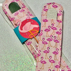 May include: Two pink nail files with a flamingo print design. One file has a white nail buffer and the other has a clear nail file. Both files are packaged in clear plastic.
