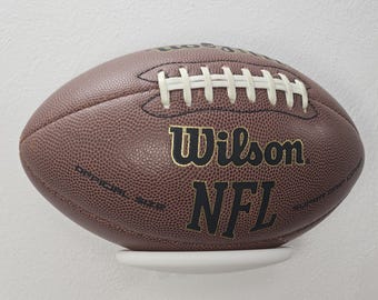 Stick It Football Display | Floating Self-Adhesive Mounted Football display shelf