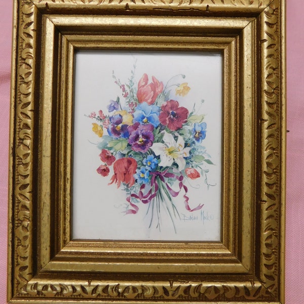 Flower bouquet print by Barbara Mock an array of colors tied with lavenders ribbon in carved gold wood frame ready to hang