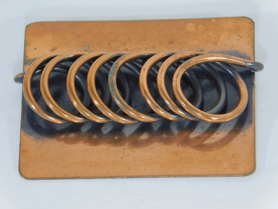 Rebaj copper brooch coiled wire on plate 1940 cop… - image 1