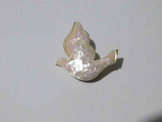 White dove signed LC in script Faux MOP on plasti… - image 1