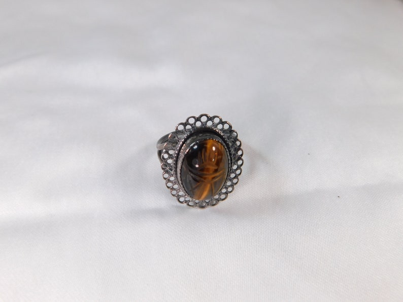 Beau sterling carved Tiger eye filigree ring adjustable