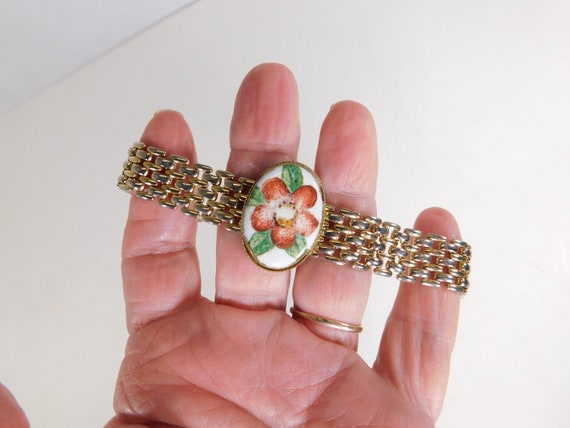 Vintage gold tone bracelet hand painted flower on… - image 1