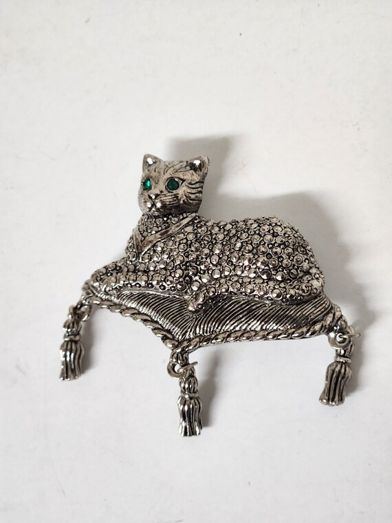 Avon Reagel cat on pillow with tassel silvertones