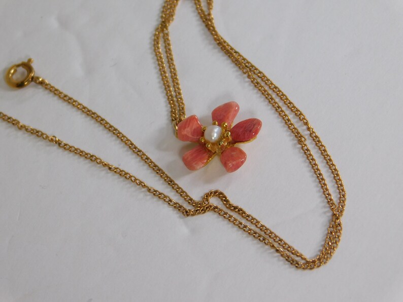Gold fill chain signed arrow in circle with pink stone petal flower pendant has tiny faux pearl in center