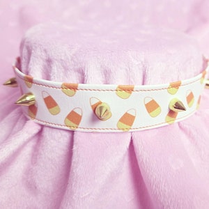 White candy corn halloween choker w/ small gold spikes