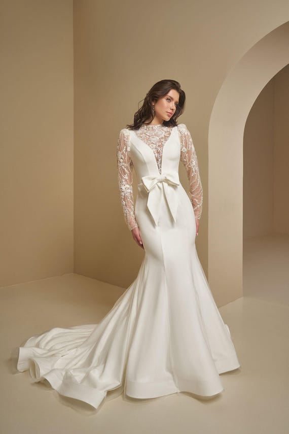 Stunning Mermaid Wedding Dress with Belt Bow, Long Lace Sleeves Bridal Dress, Deep V Neck Wedding Dress, Beaded Mermaid Fitted Wedding Gown Stunning Mermaid Wedding Dress with Belt Bow, Long Lace Sleeves Bridal Dress, Deep V Neck Wedding Dress, Beaded Mermaid Fitted Wedding Gown