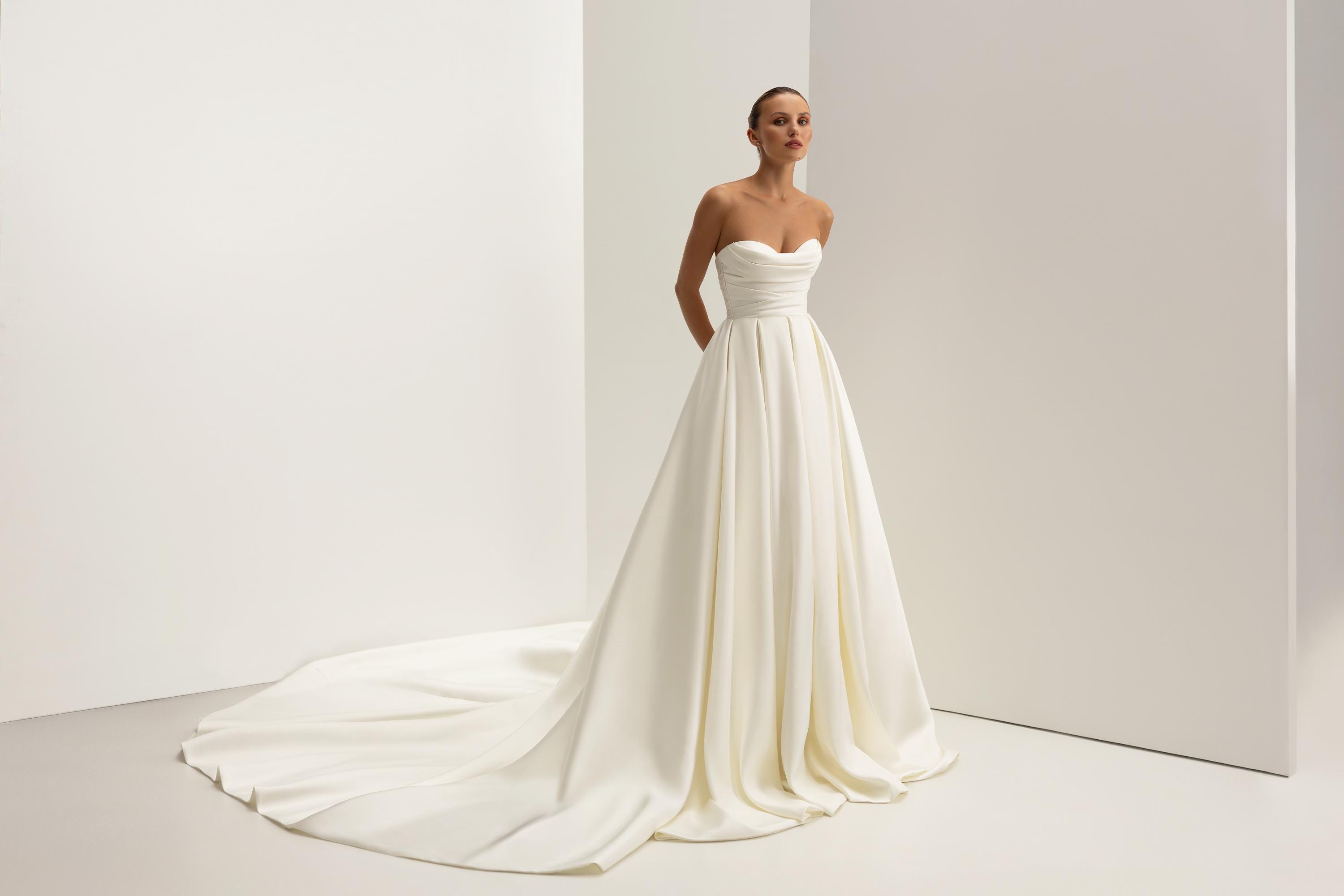Designer Long Ivory A-line Straps Jewels Sleeveless Wedding Dress With Train main image 1