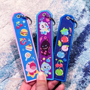 Stardew Valley Junimo, Chaos, Kirby Woven Jet Tag Keychain (1.25 x 5 inch)