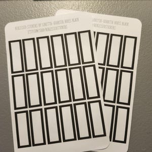 May include: Two sheets of white sticker paper with black outlines of quarter boxes. The text "Blessed Stickers by Loretta - Quarter Boxes Black Etsy.com/shop/blessedstickers" is printed on the top of the sheet.