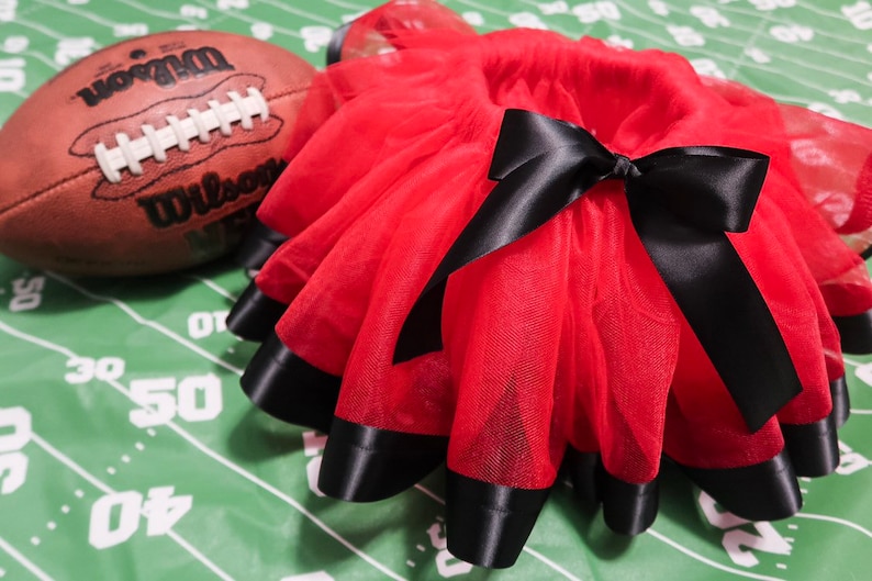 Red and Black ribbon trim girls tutu Red tulle with Black trim and bow!