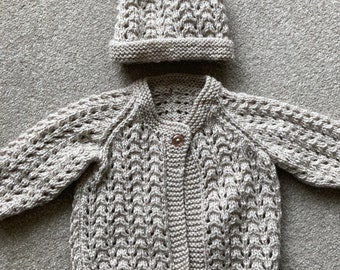 New hand knitted baby matinee cardigan with matching hat for baby 0-3 months in beige wool mix