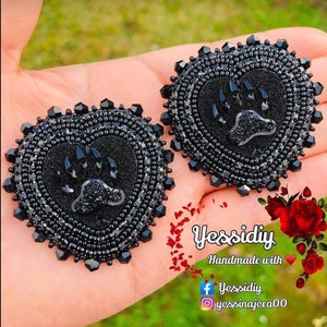 Handmade heart shaped beaded earrings with fingernail post