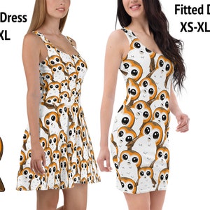 May include: Two dresses with a repeating pattern of cartoon-like creatures. The dress on the left is a skater dress, and the dress on the right is a fitted dress. The skater dress is available in sizes XS-3XL, and the fitted dress is available in sizes XS-XL.