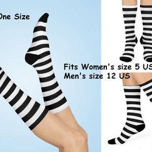 May include: A pair of crew socks featuring a horizontal black and white striped pattern. The text on the image reads One Size and Fits Women's size 5 US up to Men's size 12 US. The socks have black heels and toes with a white cuff at the top.