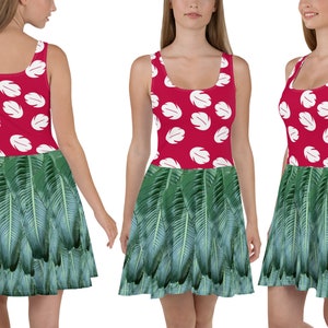 May include: A red sleeveless dress with a white floral pattern and a green tropical leaf print skirt.