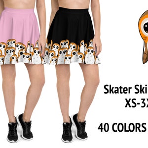 May include: Two skater skirts, one pink and one black, with a repeating pattern of cartoon Porg characters. The skirts are shown on models, with the text "Skater Skirts XS-3XL" and "40 COLORS" displayed below.
