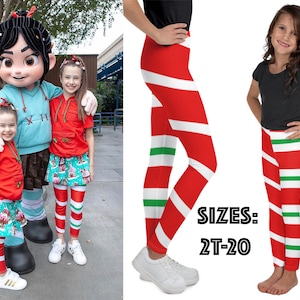 May include: Children's red leggings with white stripes and green accents, paired with red tops and matching skirts. The image also shows a cartoon character and the text "SIZES: 2T-20".