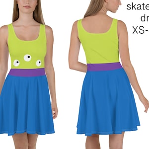 May include: A skater dress featuring a lime green bodice with three white and black eye graphics, a purple waistband, and a blue skirt. The text "skater dress XS-3XL" is visible on the right side of the image.