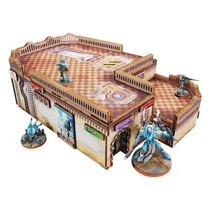 May include: A multi-level, brown and beige, wooden building with a checkered floor and a white and blue patterned design. The building has a rooftop with a railing and a small, white and blue figure standing on the roof. The building is a miniature model for a tabletop game.