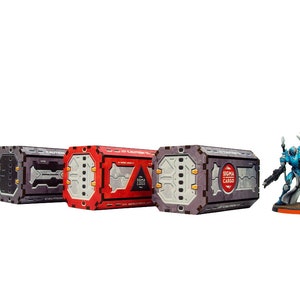 May include: Four gray, red, and black cargo containers with warning signs and the text "Sigma Cargo" on one of the containers. A blue and white robot figure with a sword stands to the right of the containers.