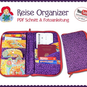 Könnte beinhalten: Ein lila Reiseorganizer mit rotem Reißverschluss und floralem Muster. Der Organizer ist geöffnet und zeigt einen Reisepass, eine Bordkarte und andere wichtige Reiseutensilien. Der Text "Reise Organizer" und "PDF Schnitt & Fotoanleitung" ist auf dem Bild sichtbar.