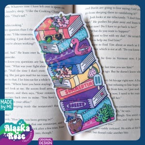 May include: A colorful sticker featuring a stack of books with summer-themed designs. The books are decorated with sunglasses, a flamingo, watermelon, and a popsicle. The sticker has the text "SUMMERTIME", "BREEZY", and "COCONUT CHILL".