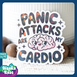 May include: A white sticker with a colorful, glittery background. The sticker features a cartoon brain with eyes and a smile, and the text "Panic Attacks Are My Cardio".