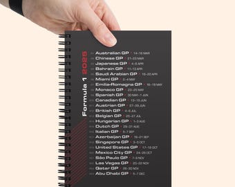 2025 F1 notebook, schedule of Grand Prix races on cover, black