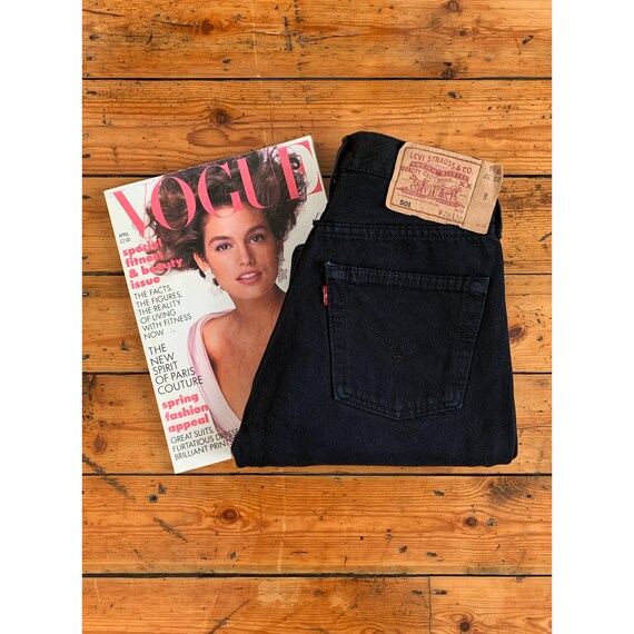 Vintage Levi’s 501 W24 L29 black raw hem denim jea