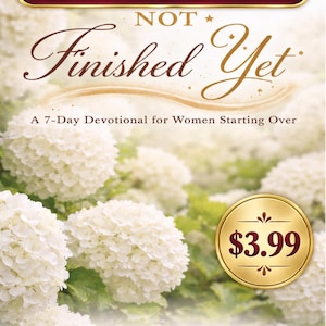 May include: A digital download devotional titled Not Finished Yet, A 7-Day Devotional for Women Starting Over by Brenda Burdine. The cover features white hydrangea flowers with a gold banner at the top and a gold circular emblem.