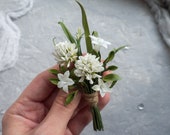 Wedding rustic greenery boutonniere with white clover, elegant grooms